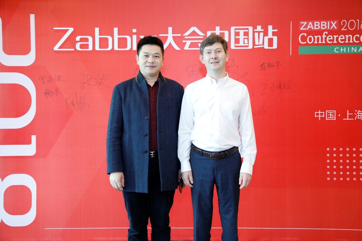 丁振興與zabbix創(chuàng)始人合影